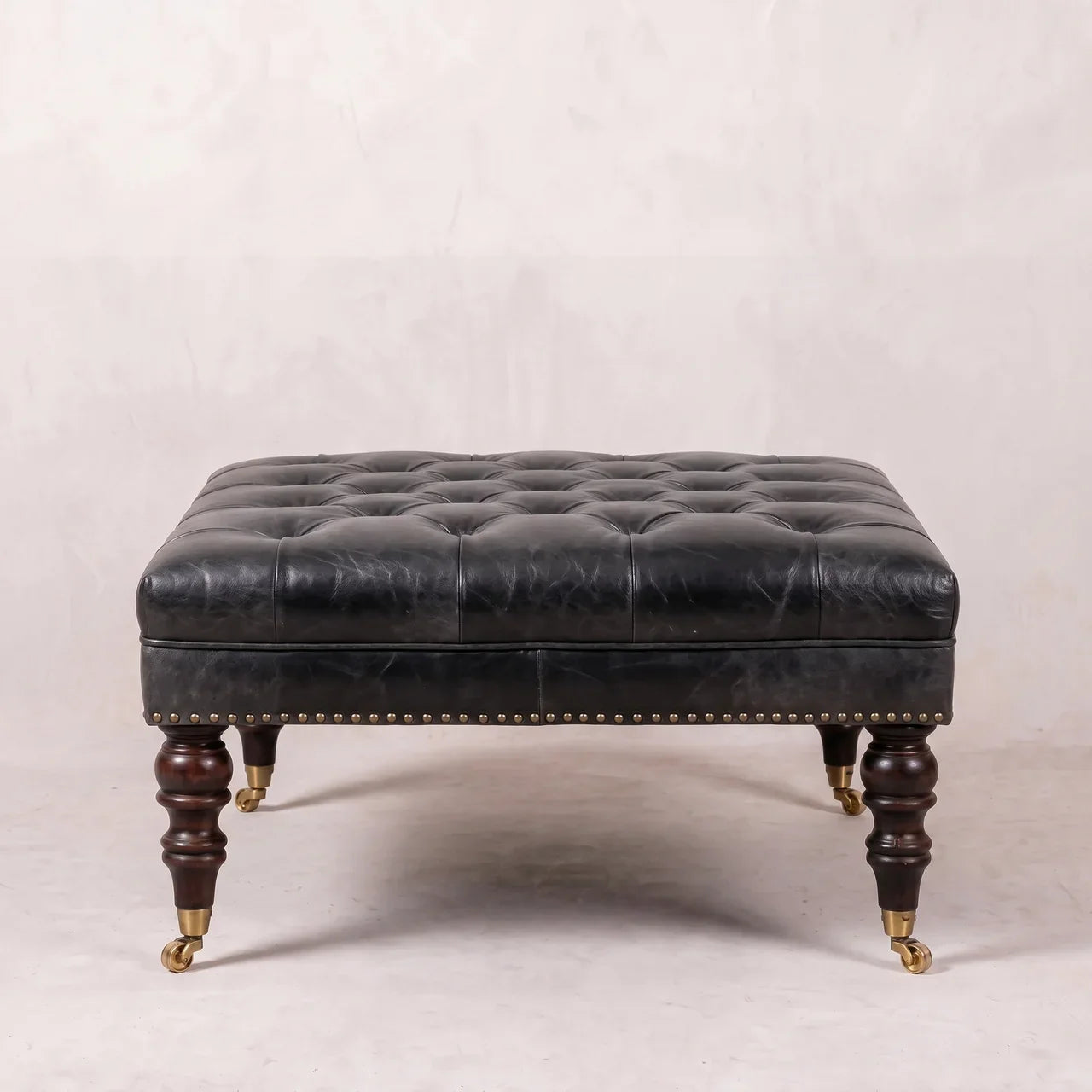 Black Leather Upholstered Ottoman