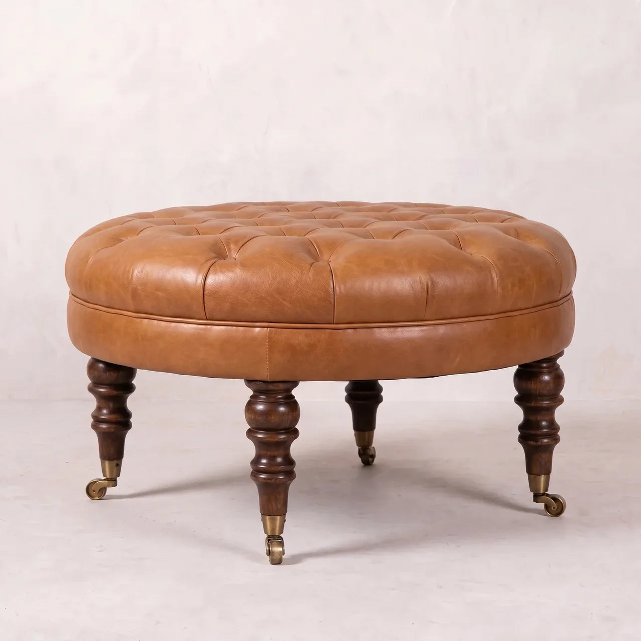 Brown Buffalo Leather Round Ottoman with Castor Legs