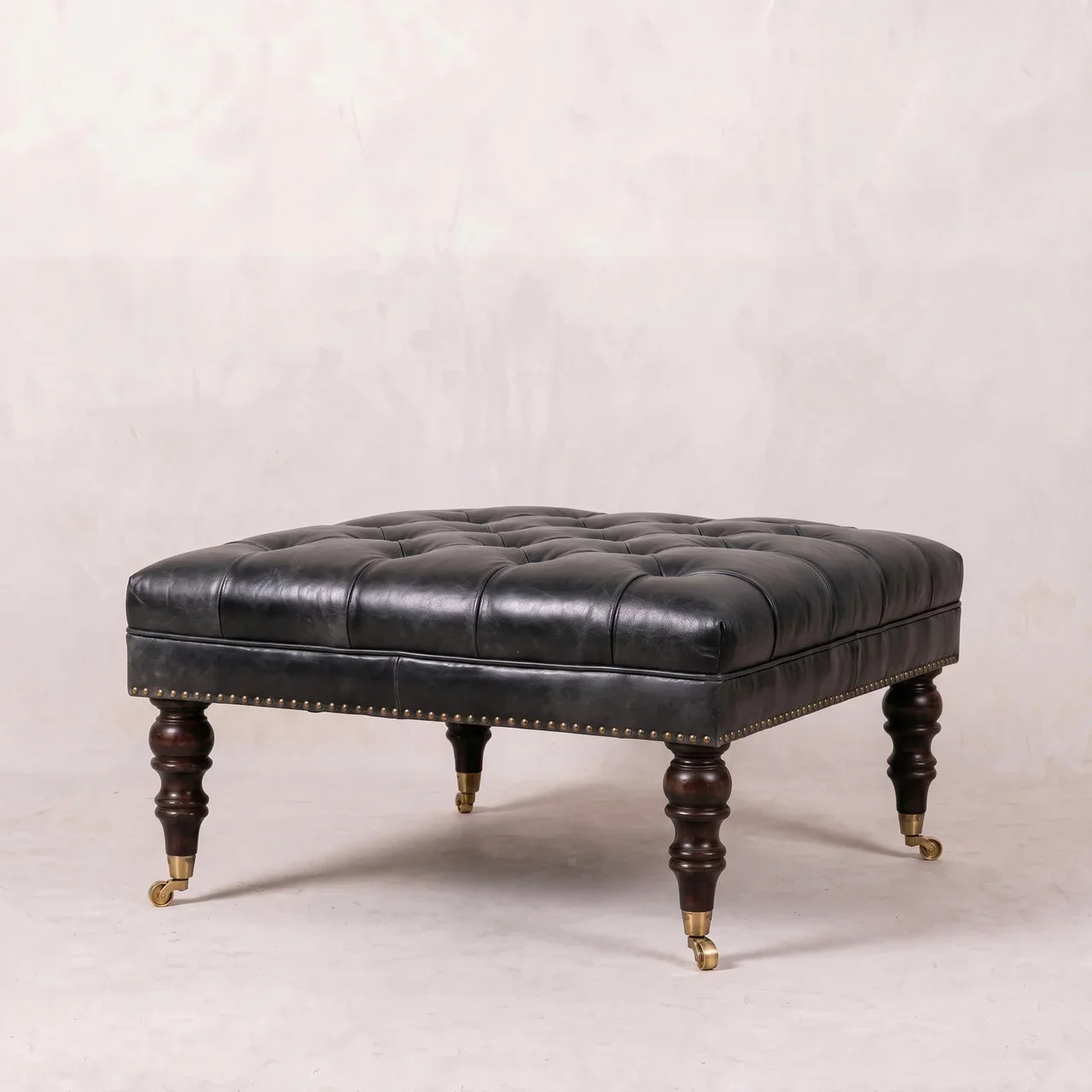 Black Leather Upholstered Ottoman