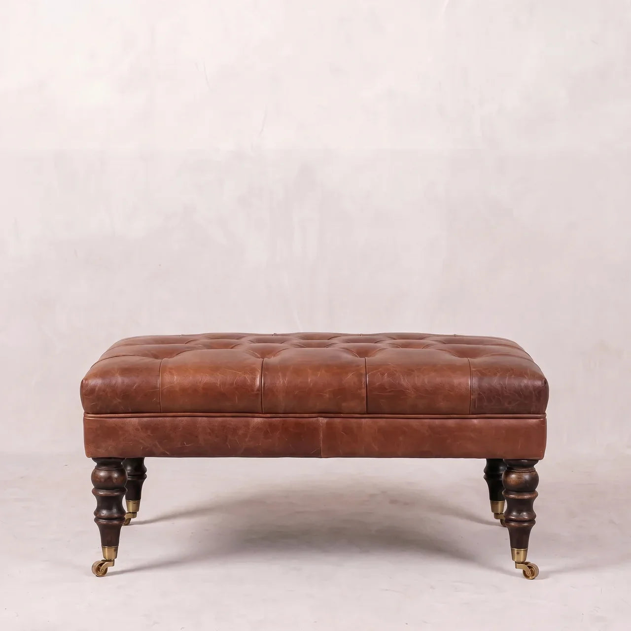 Buffalo Brown Leather Ottoman with Castor Legs