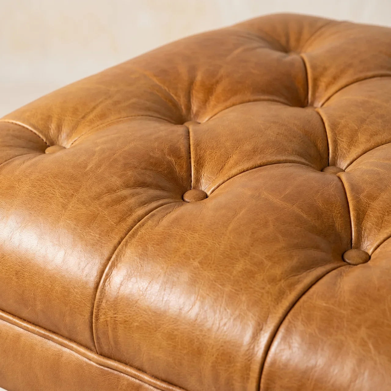 Tan Buffalo Leather Ottoman with Castor Legs — Solid Mango Wood