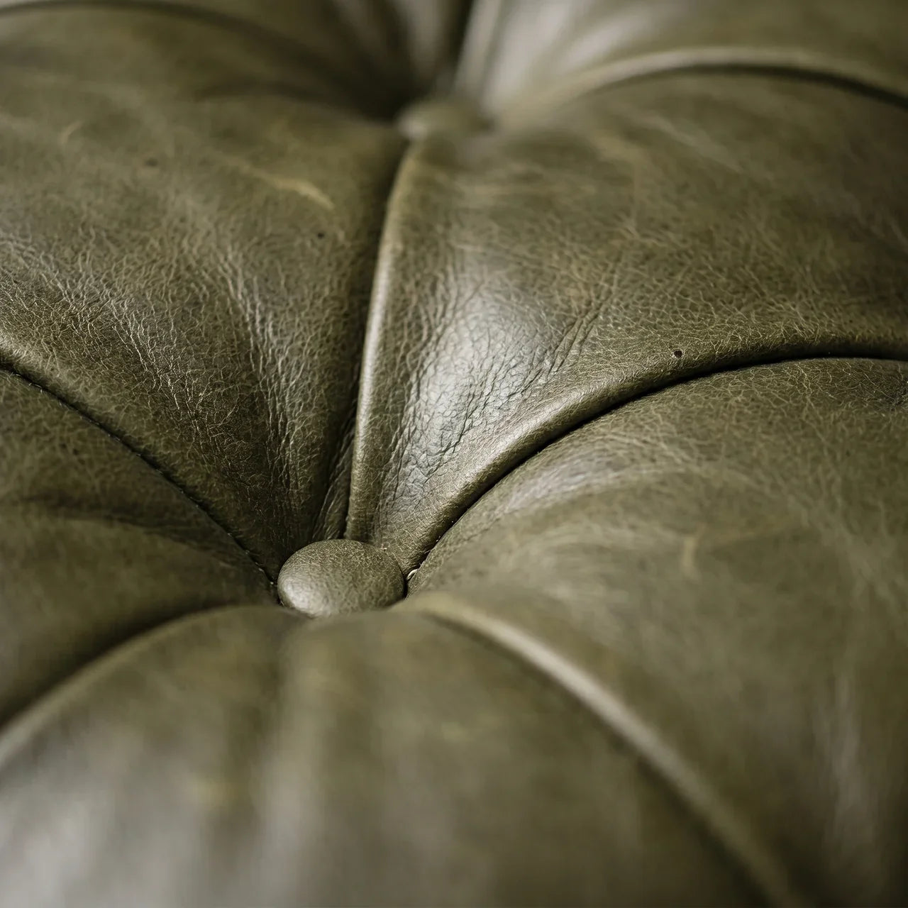 Buffalo Green Leather Ottoman with Castor Legs