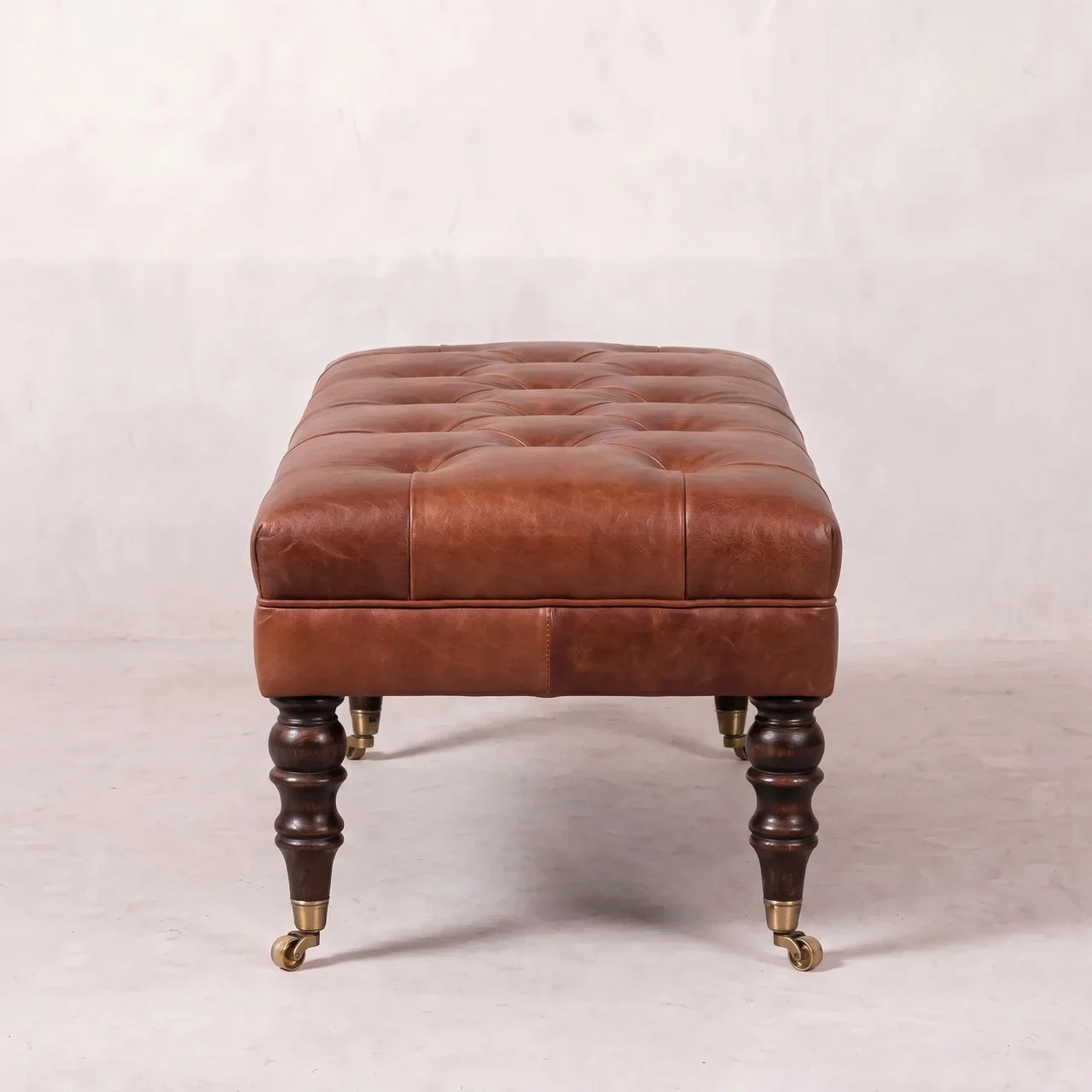 Buffalo Brown Leather Ottoman with Castor Legs