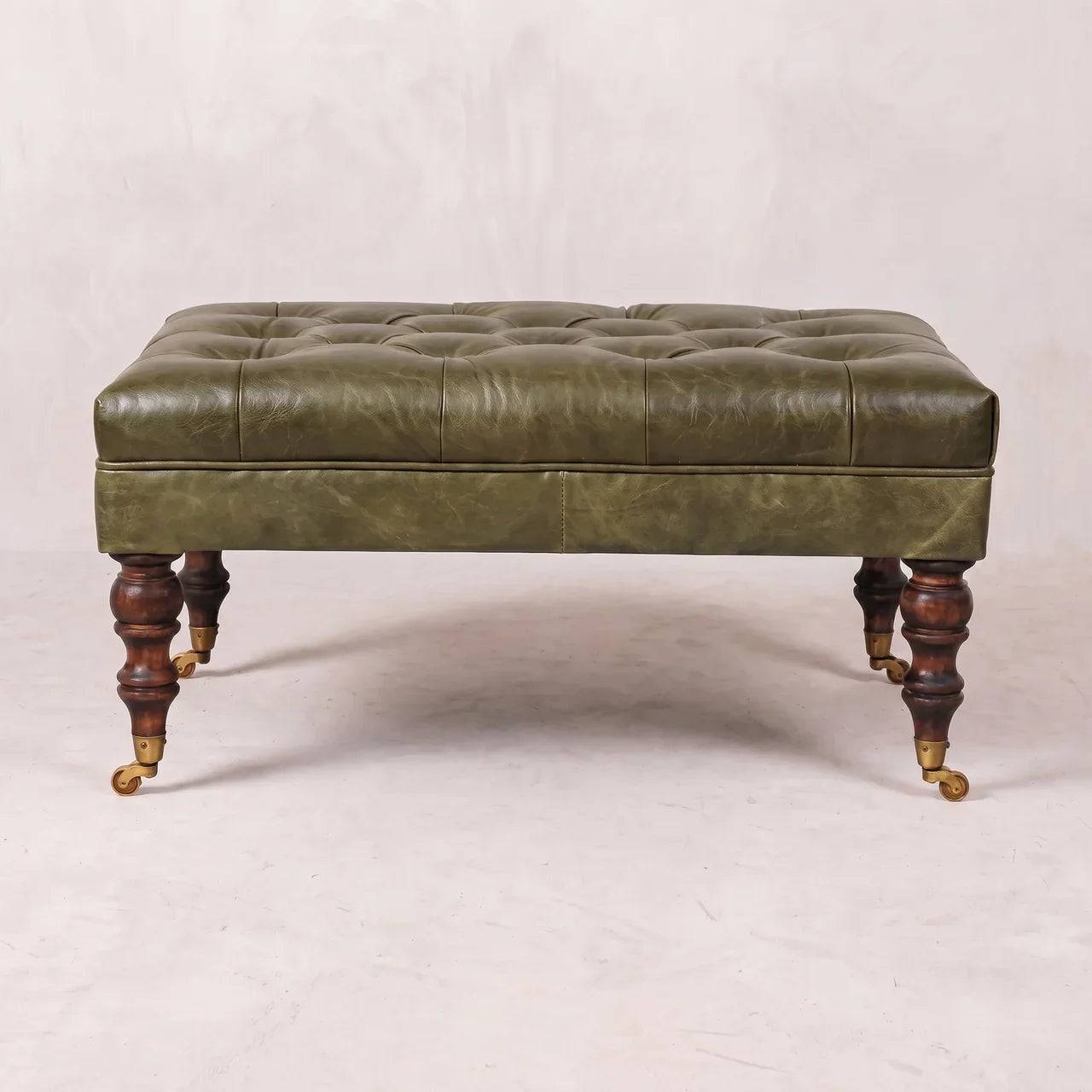 Buffalo Green Leather Ottoman with Castor Legs